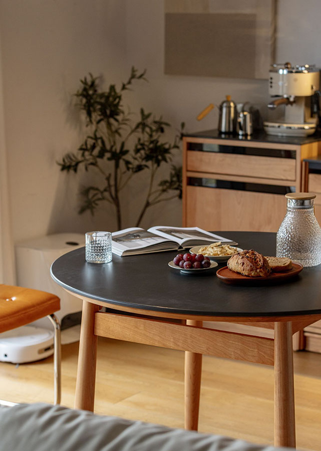 Lenta Solid Cherry Wood Round Sintered Stone Table, black colour