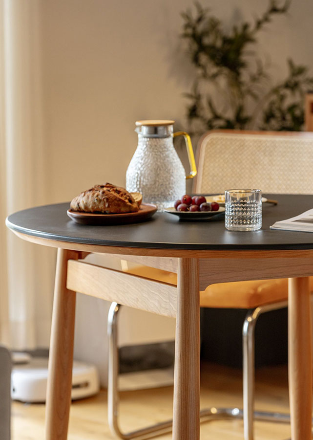 Lenta Solid Cherry Wood Round Sintered Stone Table, black colour