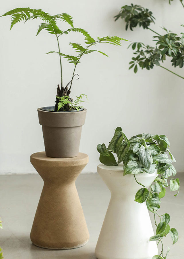 Magnesia Clay Pedestal, available in camel or ivory colour