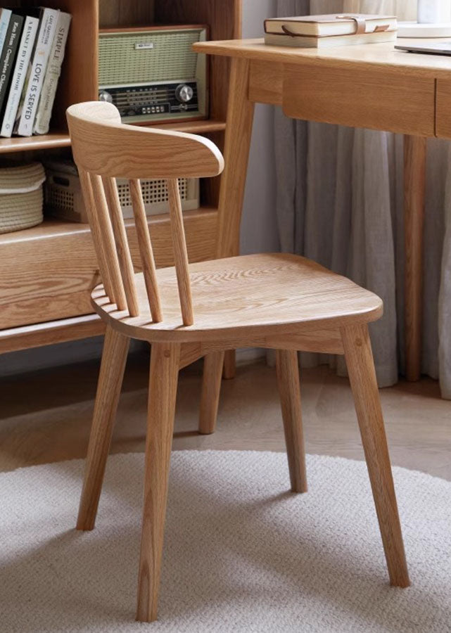 A broad-backed Solid Oak Windsor Chair for extra comfort.