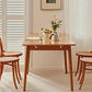 Alma Solid Wood Extendable Table, available in solid oak or solid cherry wood.