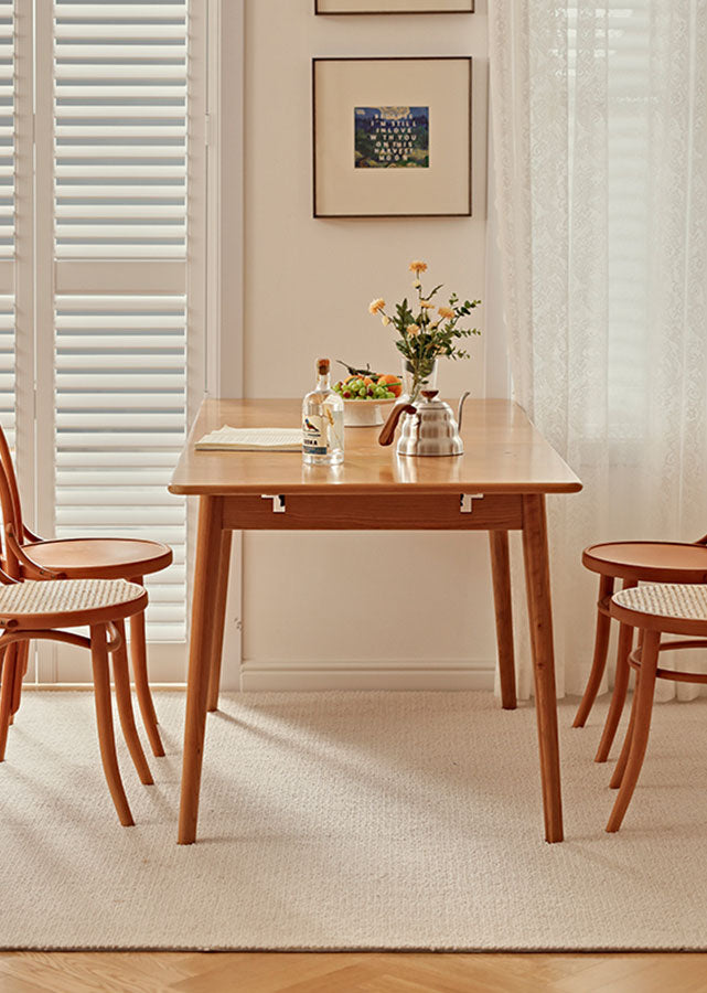 Alma Solid Wood Extendable Table, available in solid oak or solid cherry wood.