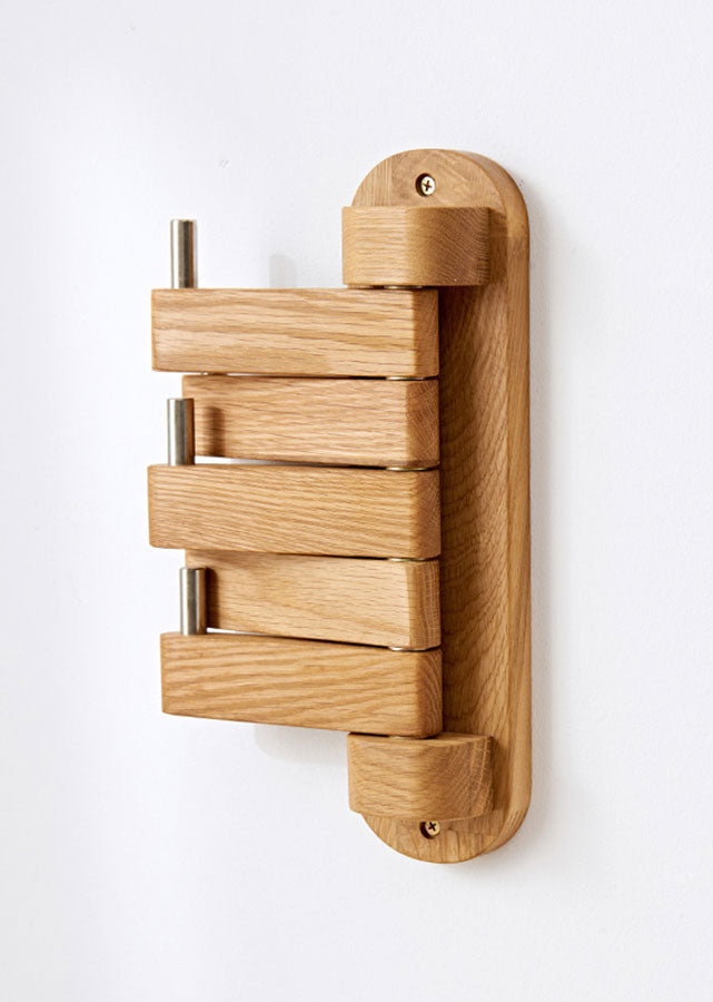 Abrir Solid Wood Wall Hook, solid oak, natural colour, placed flat.