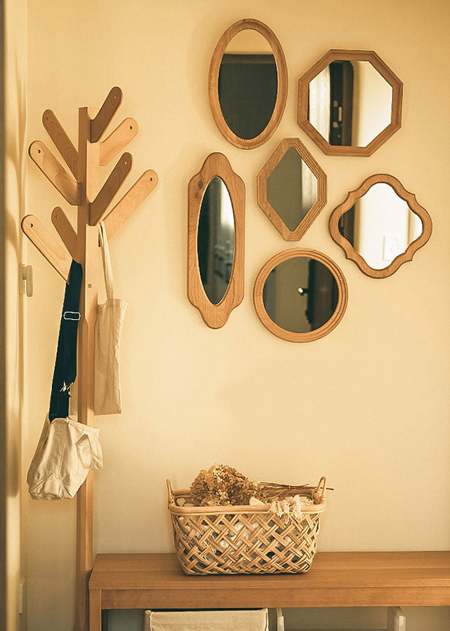 The Certa Solid Wood Geometrical Mirrors can make an accent wall when used together.