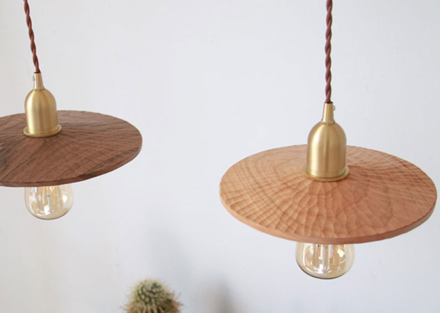 Hand-carved wooden pendant light