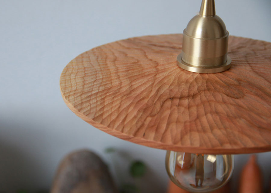 Hand-carved wooden pendant light in cherry wood