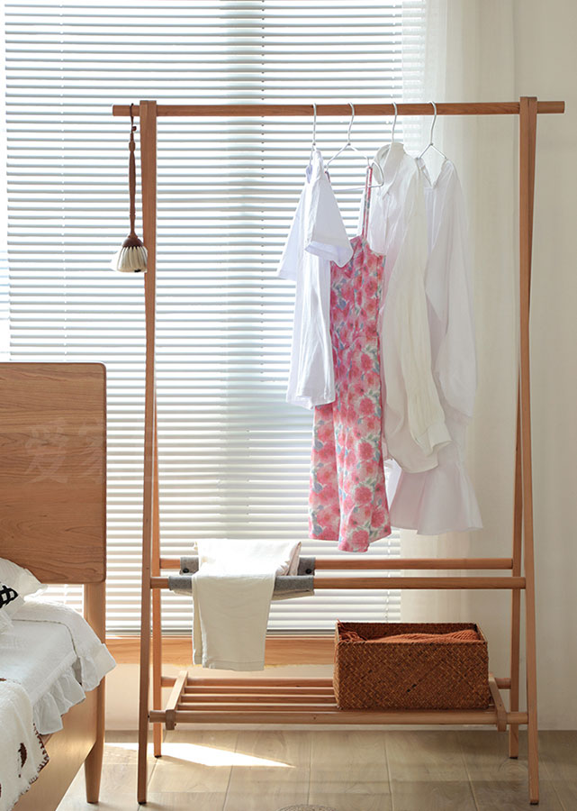 The perfect wooden clothes rack for the bedroom.