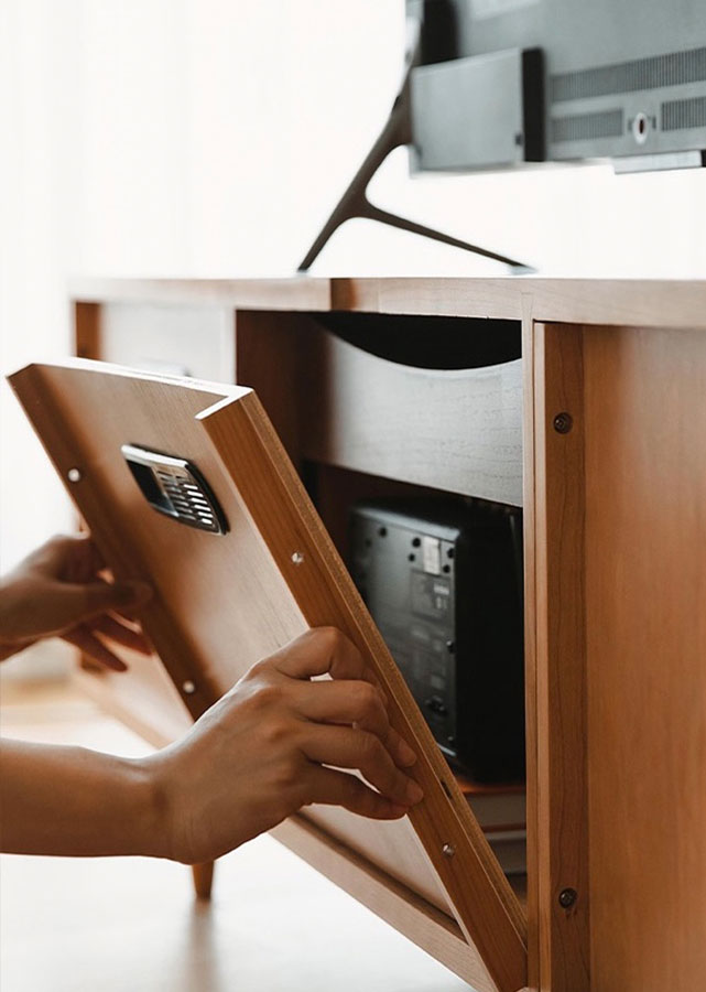 The Kentro Solid Cherry Wood TV Console's back panel is removable to facilitate cable management.