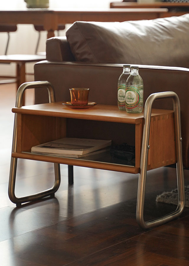Cadre Solid Wood and Stainless Steel Bench doubles up as a side table.
