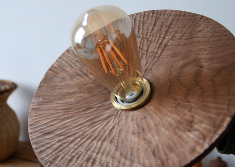 Hand-carved wooden pendant light